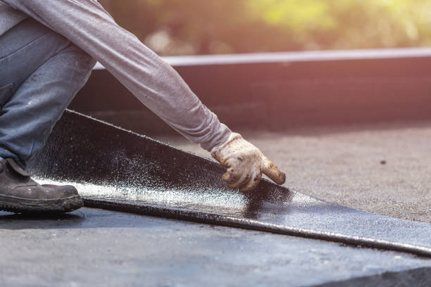 Professional Emergency Waterproofing technician working in Carleton, MI